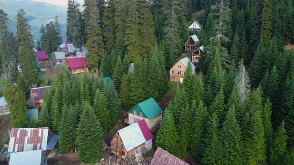 Misty Aerial View Of High Mountain Village