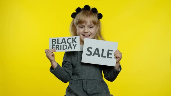 Child Kid Showing Black Friday and Sale Word Discount Advertisement Banners. Low Prices, Shopping
