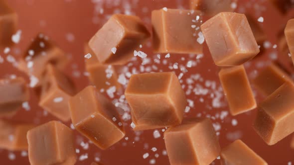 Super Slow Motion Detail Shot of Salted Caramel Explosion Towards Camera at 1000Fps