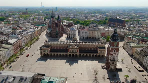 Flying over Main Square, Rynek Glowny in Krakow, Cracow city in Poland, Polska