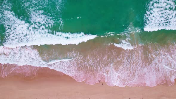 High quality footage Top view Sea beach beautiful waves Foaming and Splashing on the beach sand