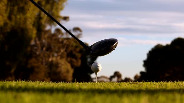 Close up of Golfer Teeing Off