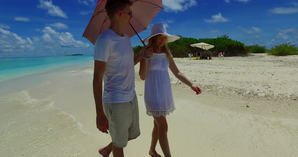 Beautiful lady and man after marriage in love enjoy life on beach on summer white sandy background 4