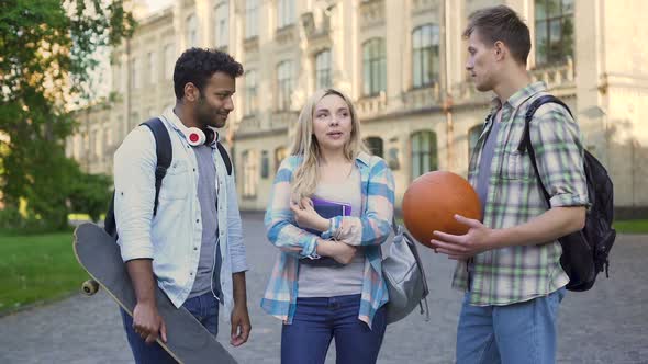 Cheerful Male Students Flirting and Hugging Pretty Female, Pick-Up Tricks