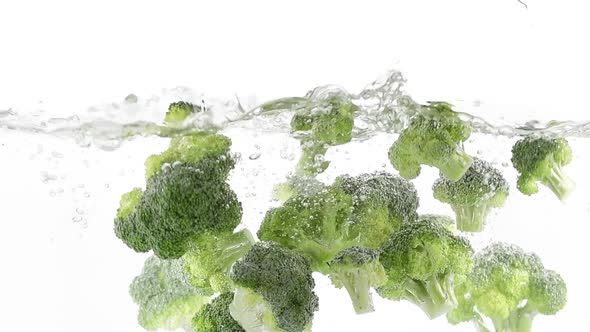 Broccoli Cabbage Falling Into Water