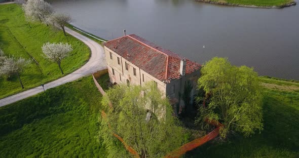 Abandoned House Facing the River