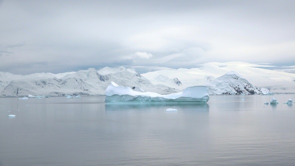 Icebergs and glaciers in Antarctica. Global Climate changes - the glaciers are warming and mellting.