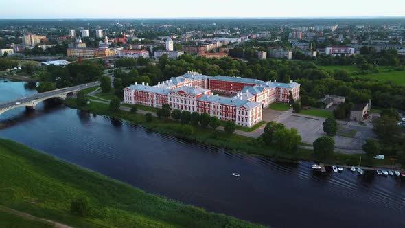 Aerial View of Jelgava City Panorama and Lielupe River in Latvia, Zemgale at Sunset 4K Dron Shot