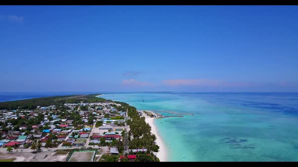 Aerial above abstract of luxury coastline beach journey by turquoise water with white sandy backgrou