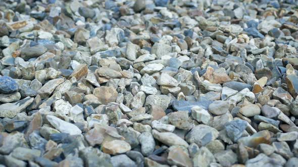 Gravel Stones Closeup Tracking Shot