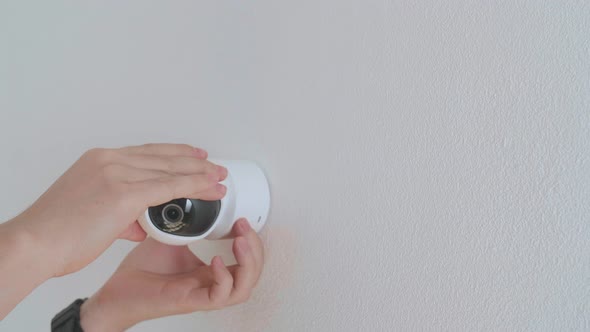 Man Hands Installing Cctv Camera On Wall For Security