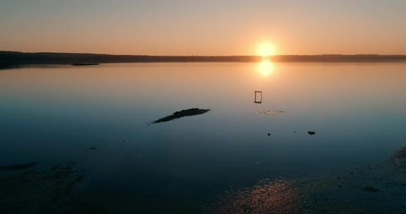 Quiet Evening at the Lake of Natural Park Drone Flies Above the Water on Sunset