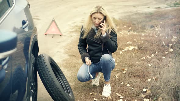 Woman Repairing Accident Car. Disappointed Woman On Broken Car. Car Insurance Service Calling.