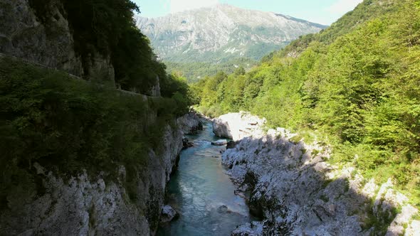 The Soča River in Slovenia, part of the Triglav National Park, has an emerald green color, and is on