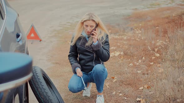 Frustrated Woman Repairing Accident Car. Sad Disappointed Woman On Broken Car. Car Insurance Service