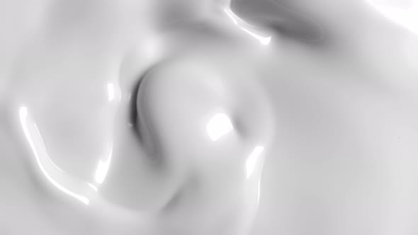 Super Slow Motion Shot of Swirling Milk Background at 1000Fps.