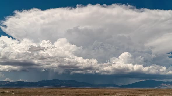 Giant cumulonimbus clouds in the Utah desert as thunderstorm forms