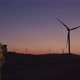 The Engineer Zooms in on the Phone While Standing Against the Windmills and Then Looks Away at the - VideoHive Item for Sale
