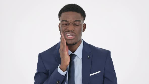 African Businessman Having Toothache Cavity on White Background