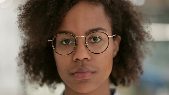 Close Up of Young African Businesswoman Looking at the Camera 