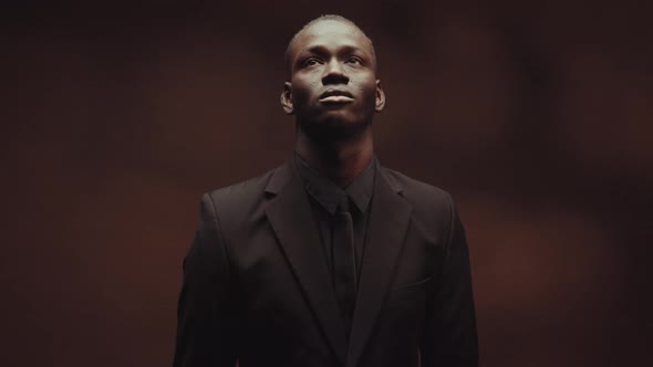 Elegant Black Man Looking Upwards