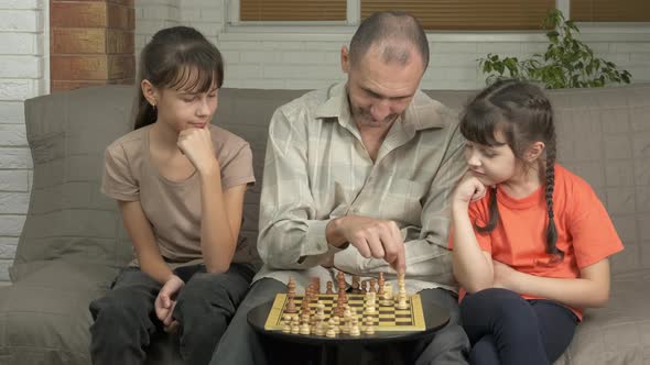 Parent and children chess competition indoor. 