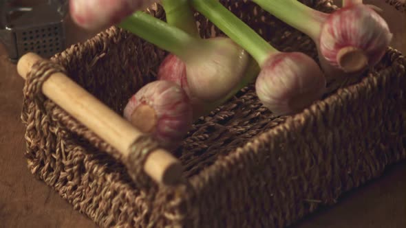 Super Slow Motion Garlic Falls Into the Basket