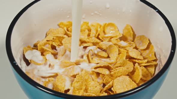 Milk Being Poured Onto the Corn Flakes