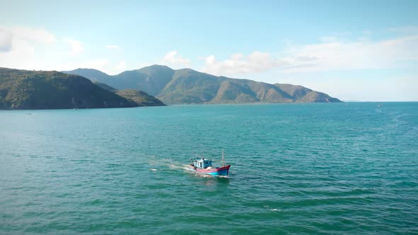 Professional Fishing Vessel, Shooting From Drone of an Asian Fishing Schooner a Boat with Crab Traps