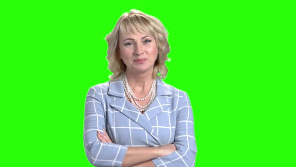 Pretty Mature Woman Smiling on Green Screen.