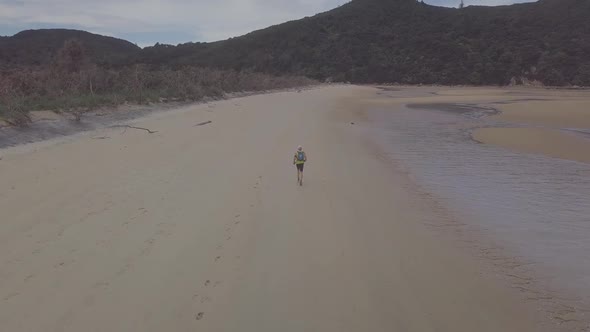 Running on the beach aerial