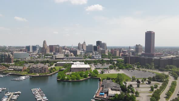 Buffalo, New York skyline with marina drone videoing up.