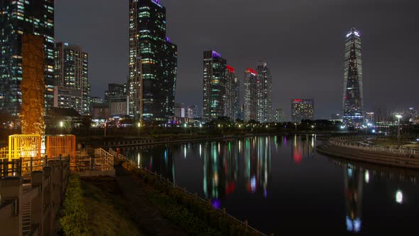 Timelapse Illuminated Incheon Skyscrapers at Harbour