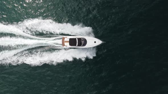 Aerial View of Speed Motor Boat on Open Blue Sea