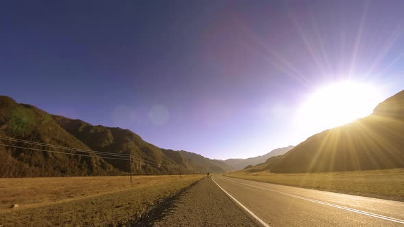 Mountain Road Timelapse at the Summer or Autumn Sunset Sunrise Time