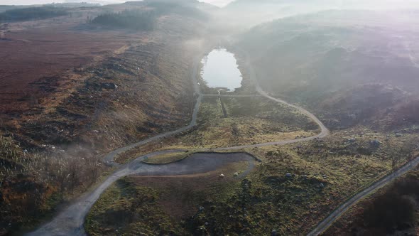 Aerial View of Bonny Glen in County Donegal with Fog  Ireland