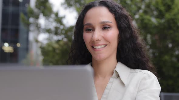 Hispanic Caucasian Happy Smiling Woman University Student Learning Online Using Laptop Computer