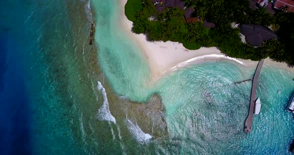 Beautiful drone island view of a summer white paradise sand beach and blue water background