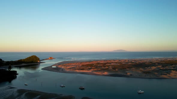 Aerial view of Nature Reserve near Mangawhai Beach during beautiful sunset in New Zealand.