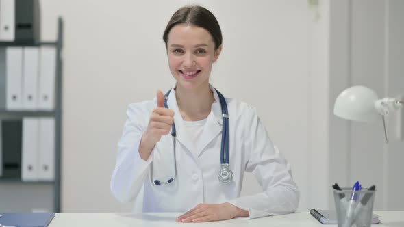 Thumbs Up Sign By Female Doctor