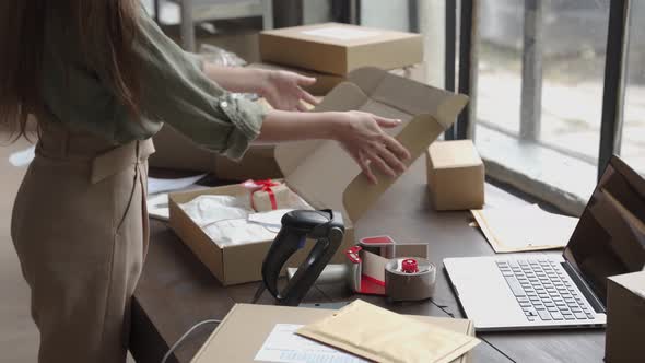 Female Online Store Business Owner Packing Ecommerce Parcel Shipping Box