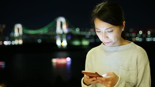 Young woman with mobile phone