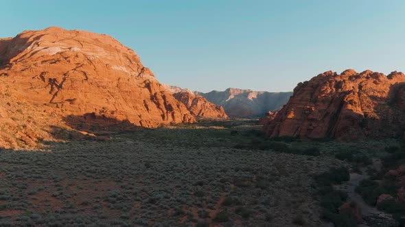 Drone view in Snow Canyon State Park at sunset.