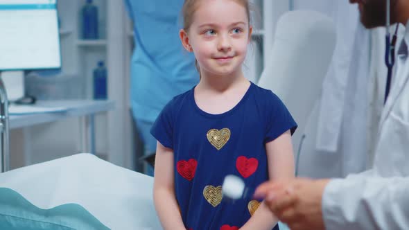 Close Up of Doctor Using Stethoscope