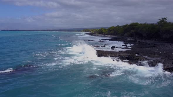 Flying Over The Rugged Coastline Of Hawaii