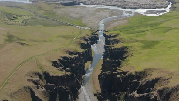 Drone View Orbit Around Amazing Panorama of Fjadrargljufur Canyon in South Iceland