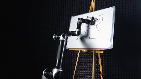 Modern Technology, Robot Draws a Picture, a Futuristic Robot Hand Draws a Marker on a Blackboard