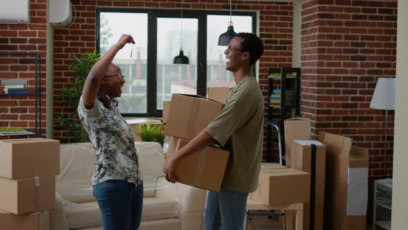 Husband and Wife Feeling Proud About Having Household Keys