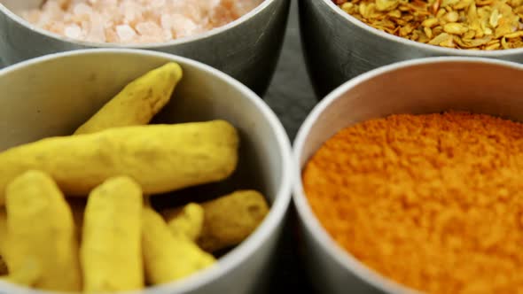 Various type spices in bowl 4k