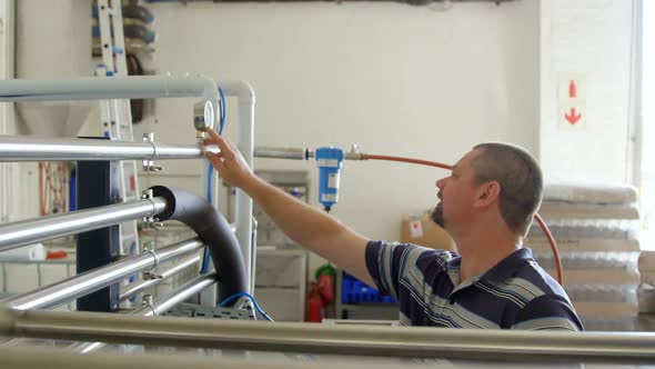 Male worker working in factory